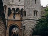 Windsor Castle is a royal residence at Windsor in the English county of Berkshire, about 25 miles west of central London. It is strongly associated with the English and succeeding British royal family, and embodies almost a millennium of architectural history.