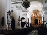 The Church of the Holy Cross is a Roman Catholic house of worship in Warsaw, Poland. Located on Krakowskie Przedmieście opposite the main Warsaw University campus, it is one of the most notable Baroque churches in Poland's capital.