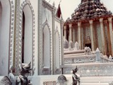 Wat Phra Kaew, commonly known in English as the Temple of the Emerald Buddha and officially as Wat Phra Si Rattana Satsadaram, is regarded as the most sacred Buddhist temple in Thailand. The complex consists of a number of buildings within the precincts of the Grand Palace in the historical centre of Bangkok.