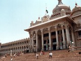 Words of wisdom cast in stone on Vidhana Soudha, Bangalore, India

Government work is GOD'S Work.