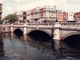 O'Connell Bridge is a road bridge spanning the River Liffey in Dublin, Ireland, which joins O'Connell Street to D'Olier Street, Westmoreland Street and the south quays